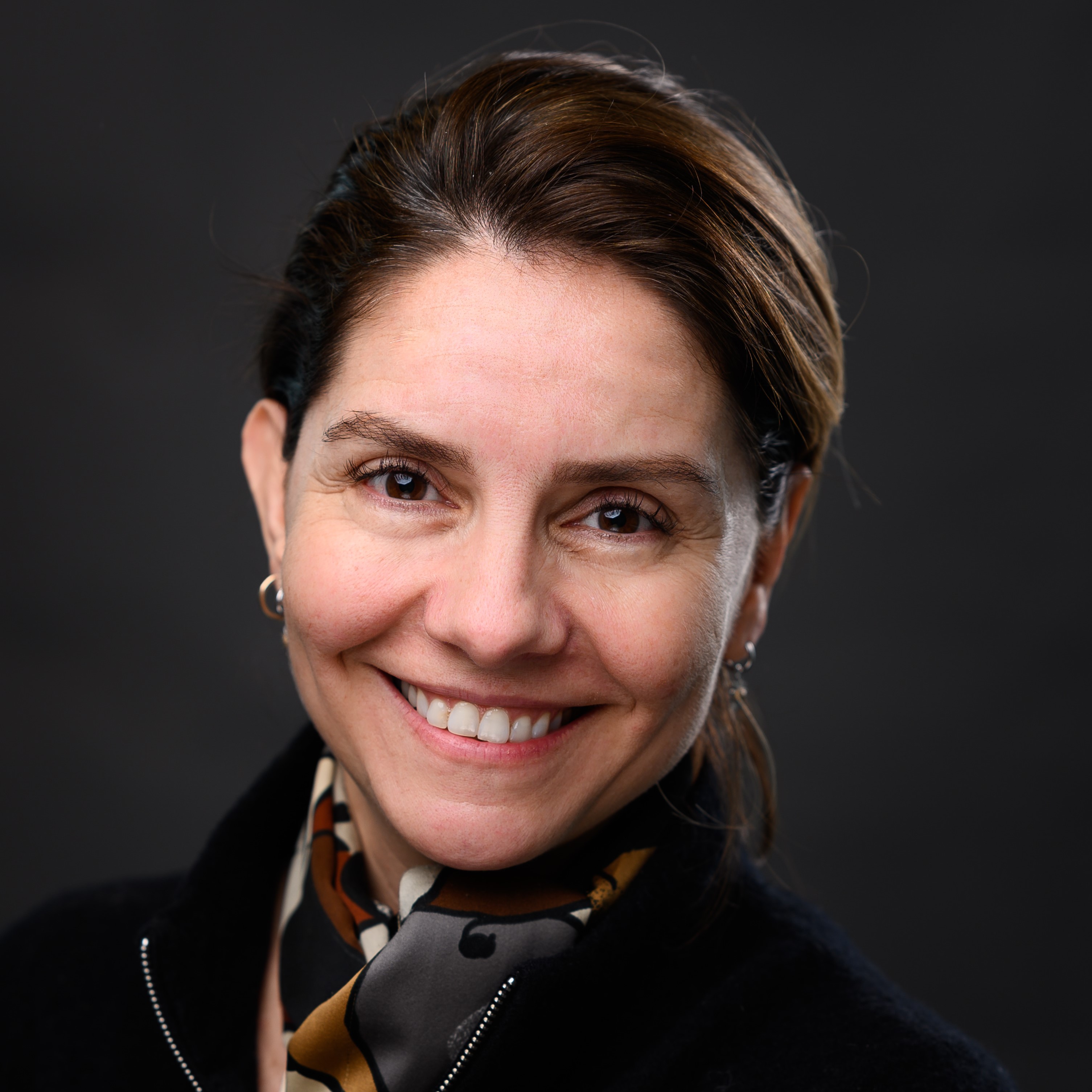 a person smiling at camera