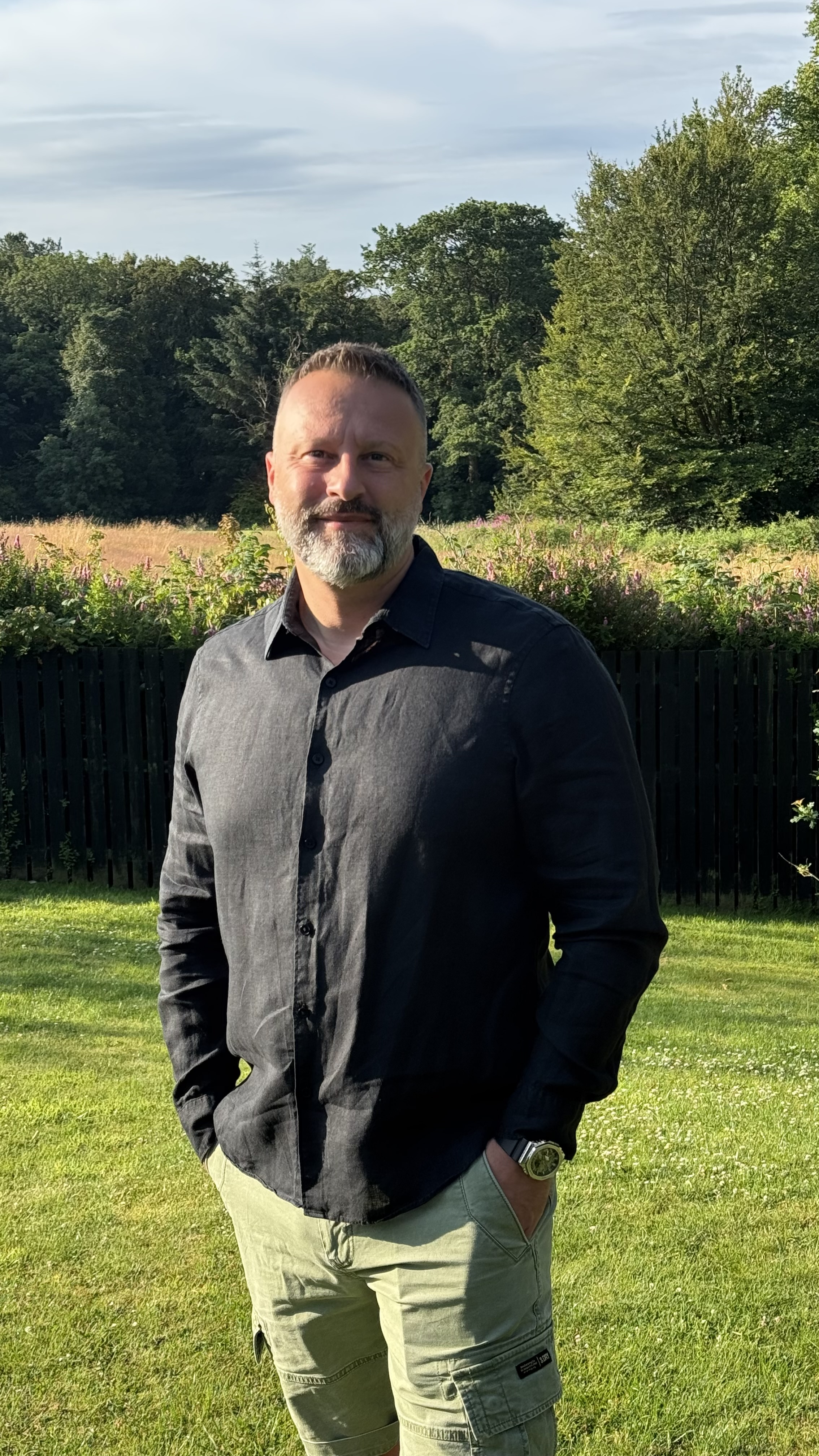 a person standing in a yard