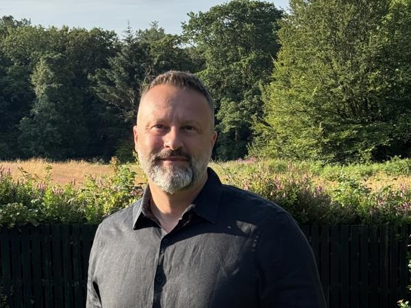 a person standing in a yard