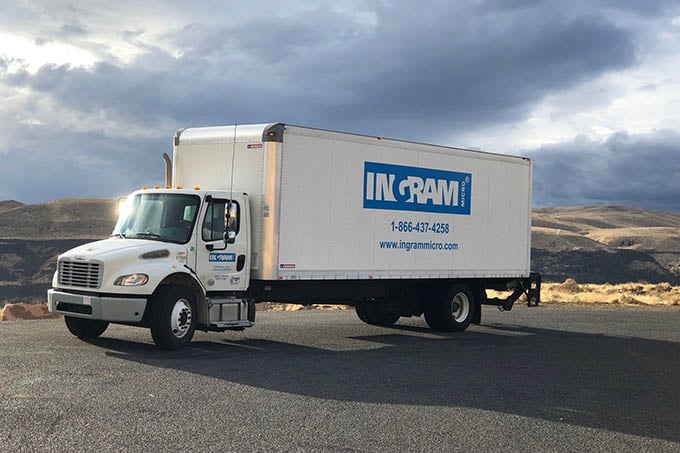 a white truck on a road