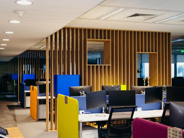 a room with persony computers