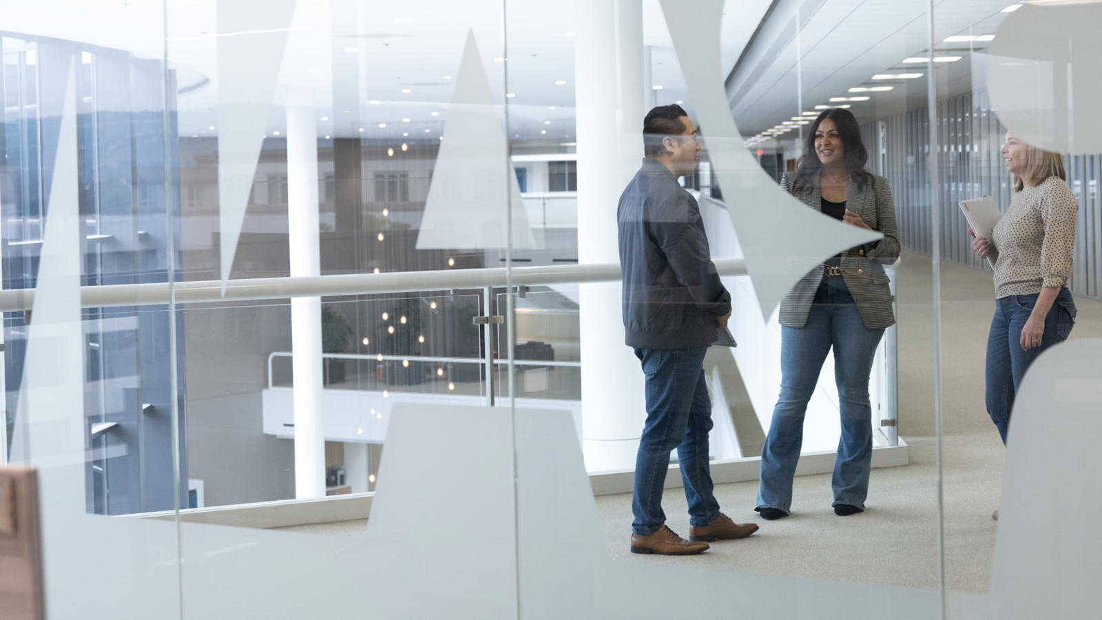 a group of people standing in a room