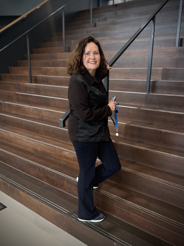 a person standing on a staircase
