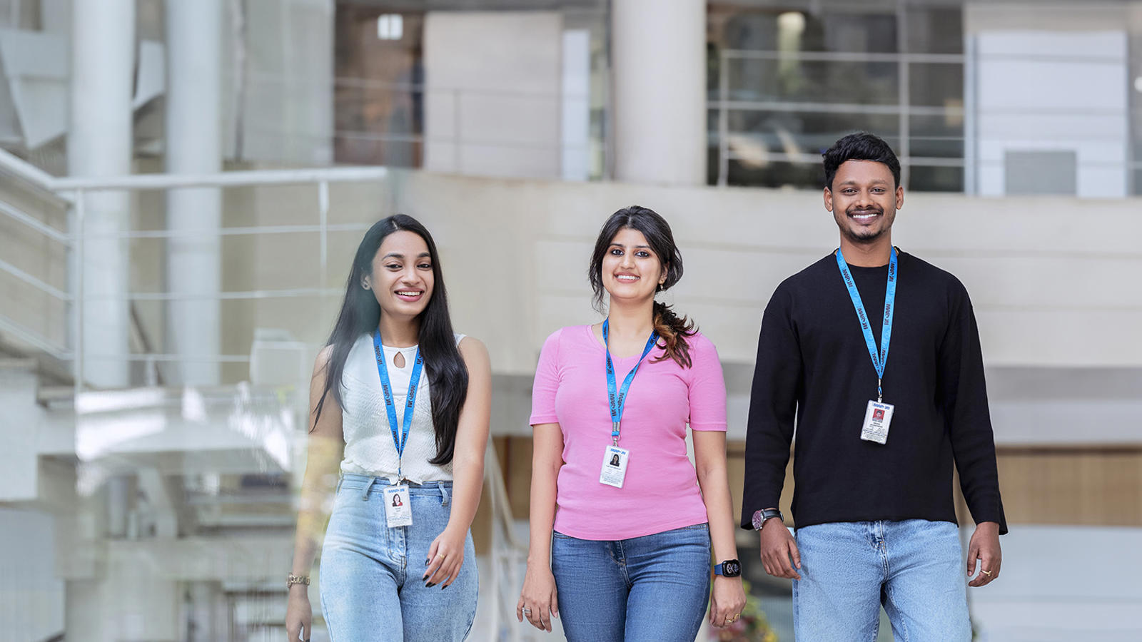 a group of people standing in a building