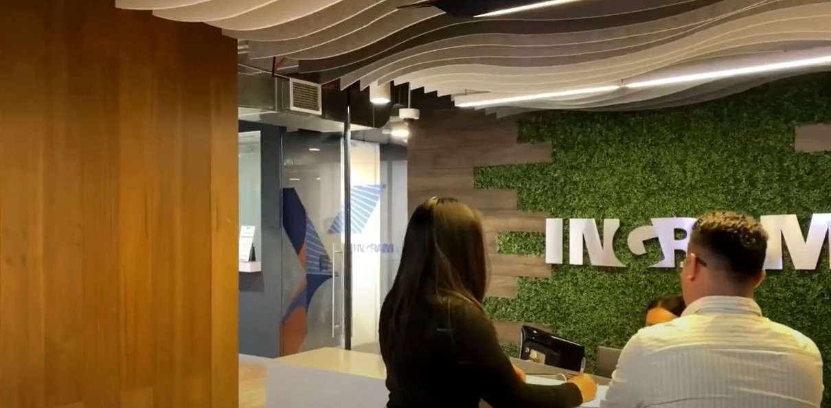 a person standing at a desk
