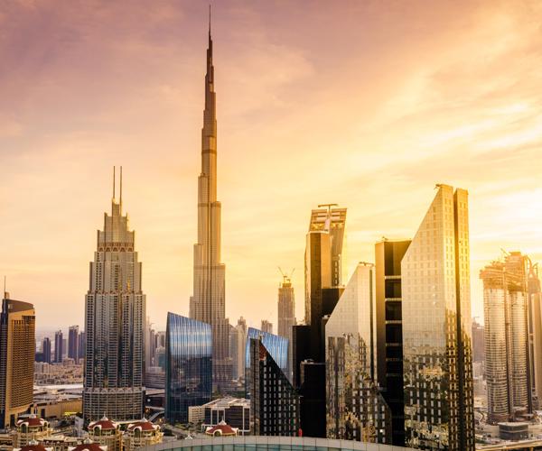 a city skyline with tall buildings