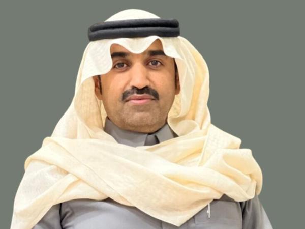 a person wearing a head scarf and a white scarf