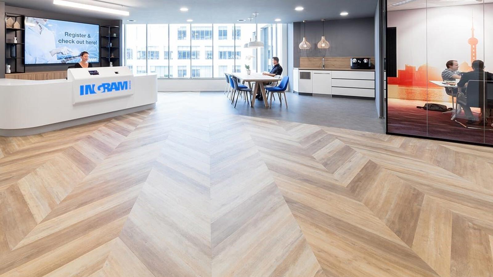 a room with a reception desk and a table