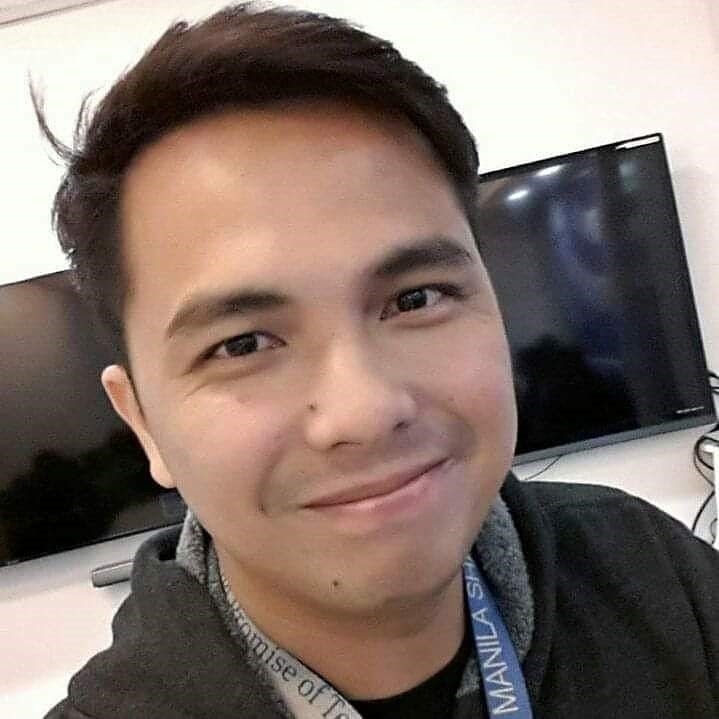 a person smiling for a selfie