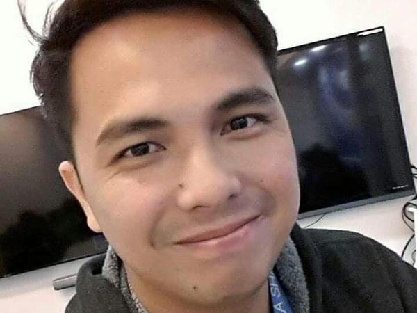 a person smiling for a selfie