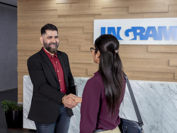 a man and woman shaking hands