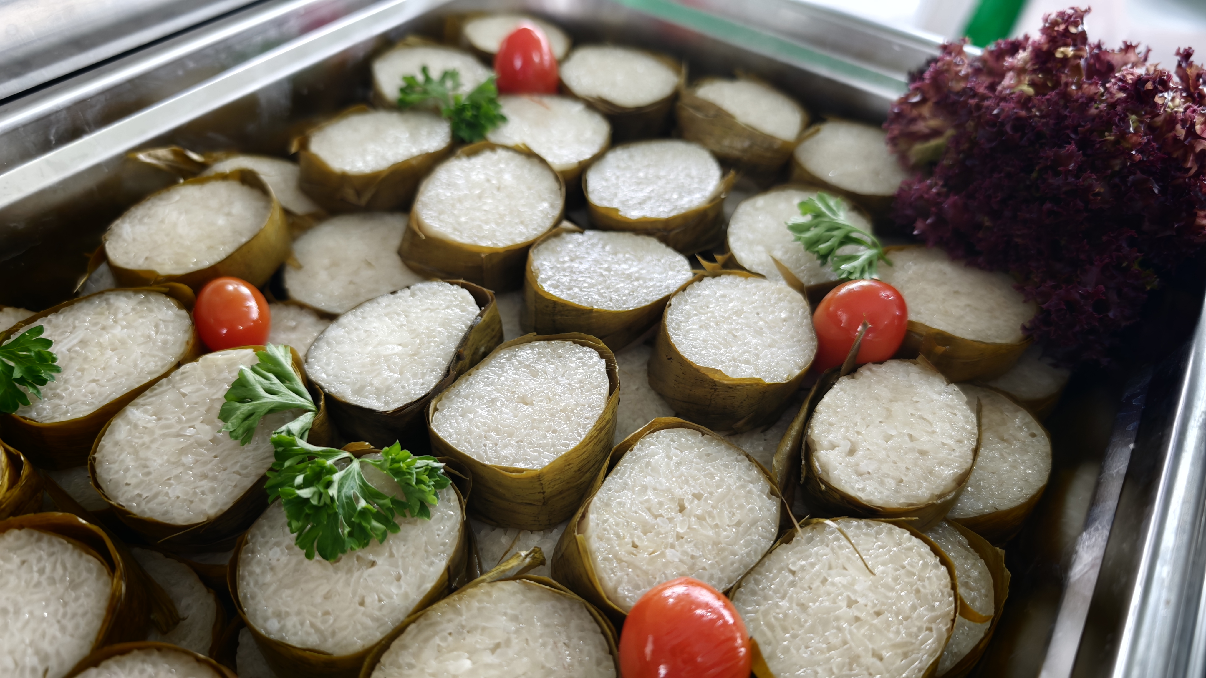 a tray of food with vegetables