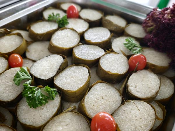 a tray of food with vegetables