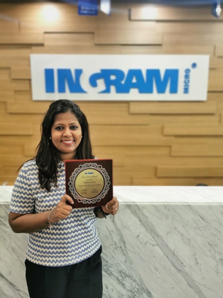 a person holding a plaque