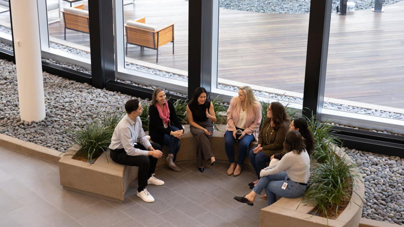 a group of people sitting in a circle