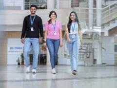 a group of people walking in a building