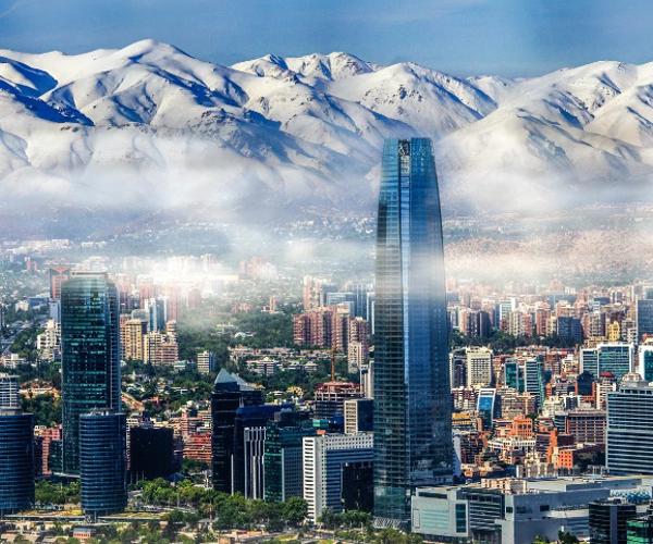 a city with mountains in the background