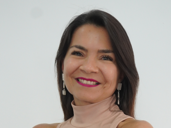 a person smiling at camera