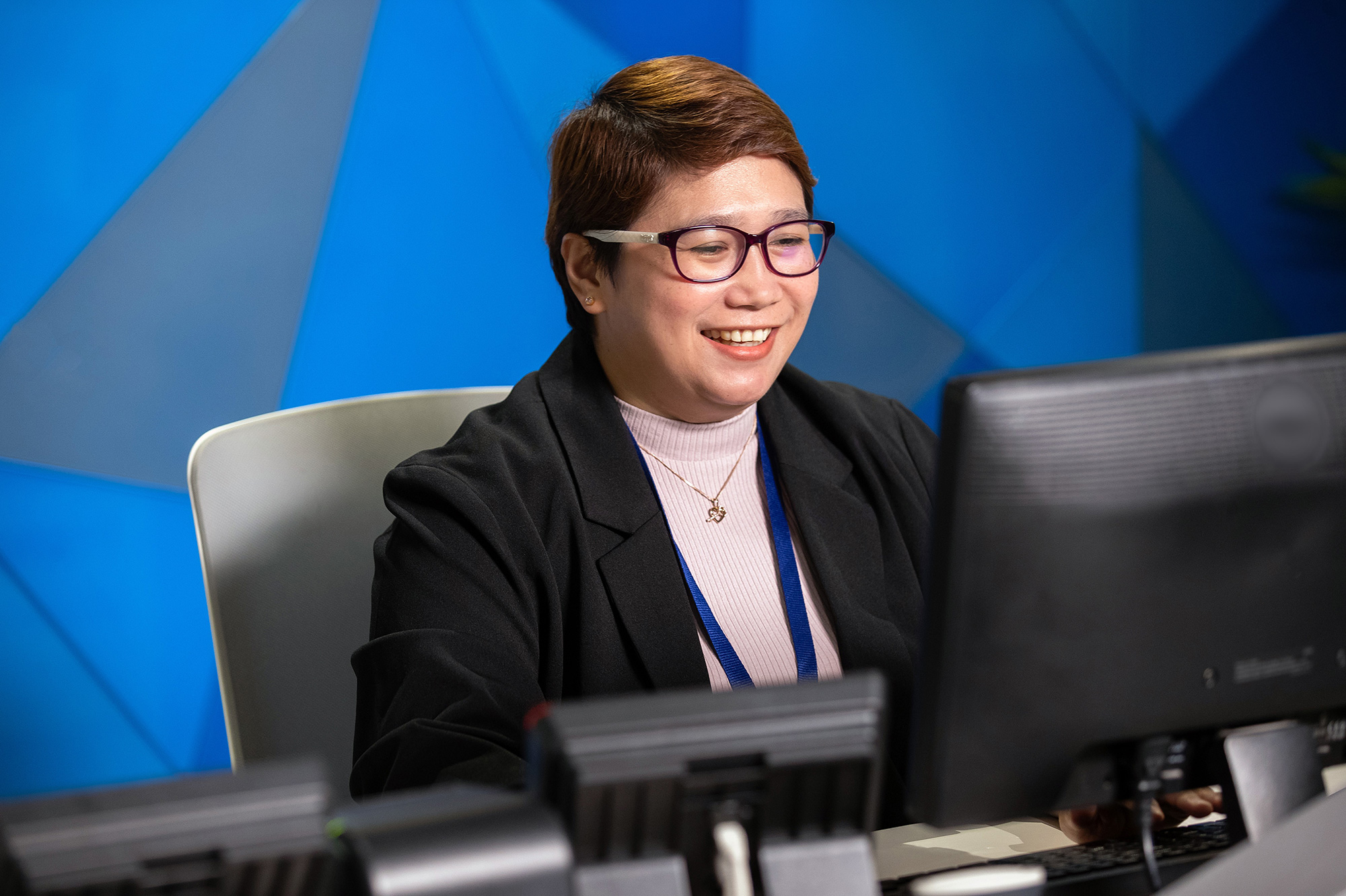 Associate Working On Computer