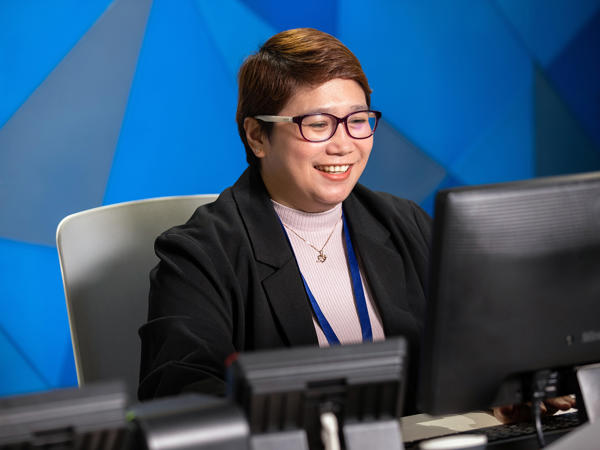 Associate Working On Computer
