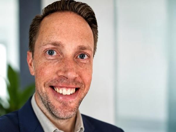 a person smiling at the camera