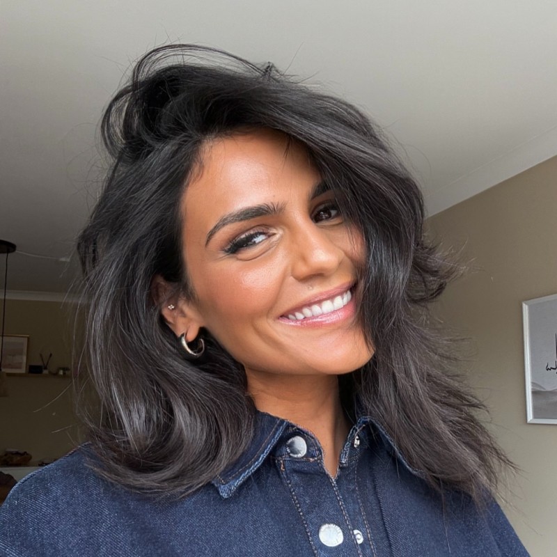 a person smiling at the camera