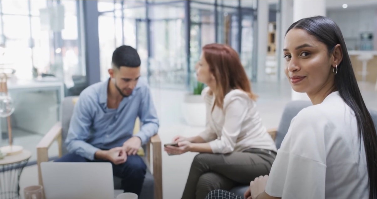a group of people sitting in a circle