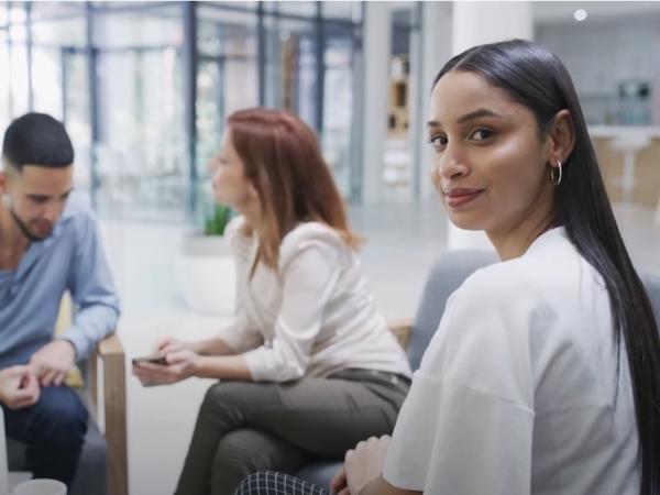 a group of people sitting in a circle
