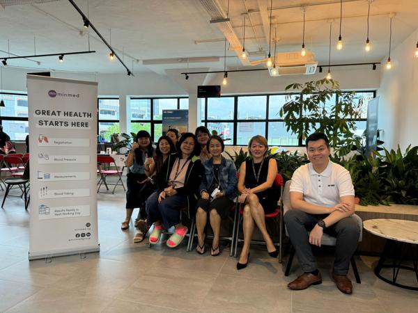 a group of people sitting in a room