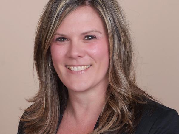 a person smiling for a picture