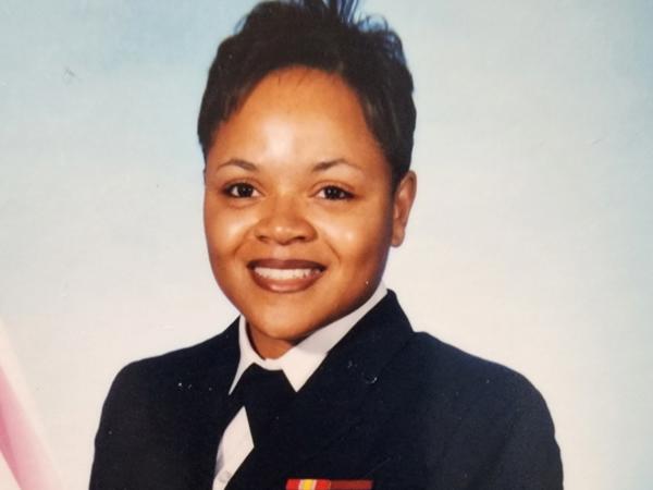 a person in uniform smiling