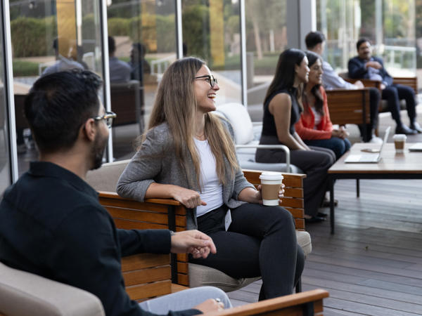 a group of people sitting on benches