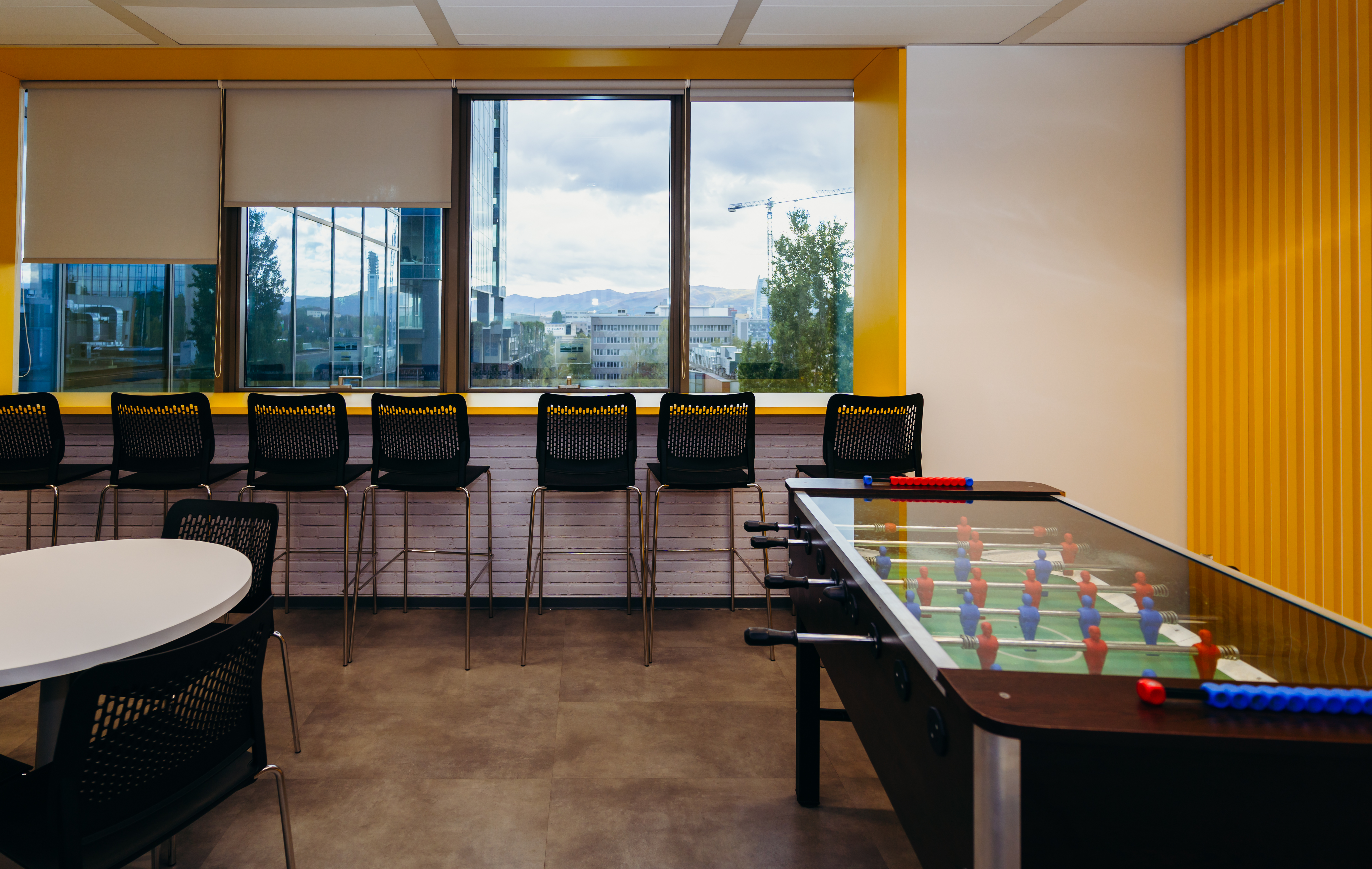 a room with a table and chairs