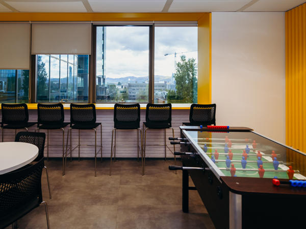 a room with a table and chairs