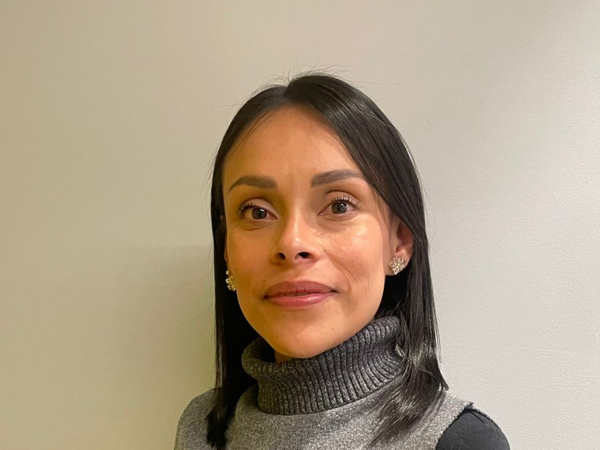 a person in a turtleneck sweater