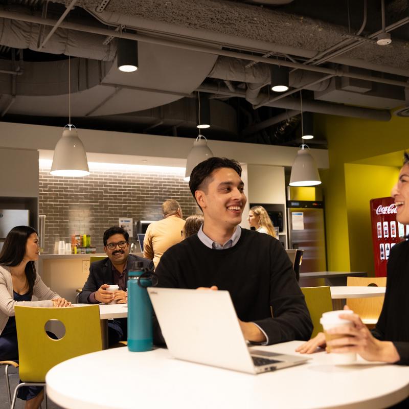 a group of people sitting at a table