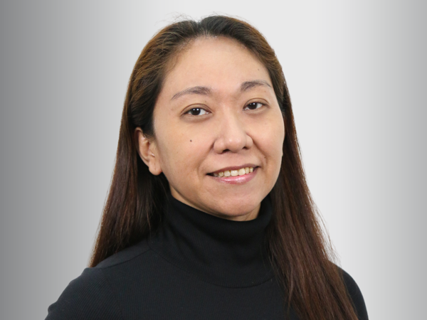 a person with long hair wearing a black turtleneck