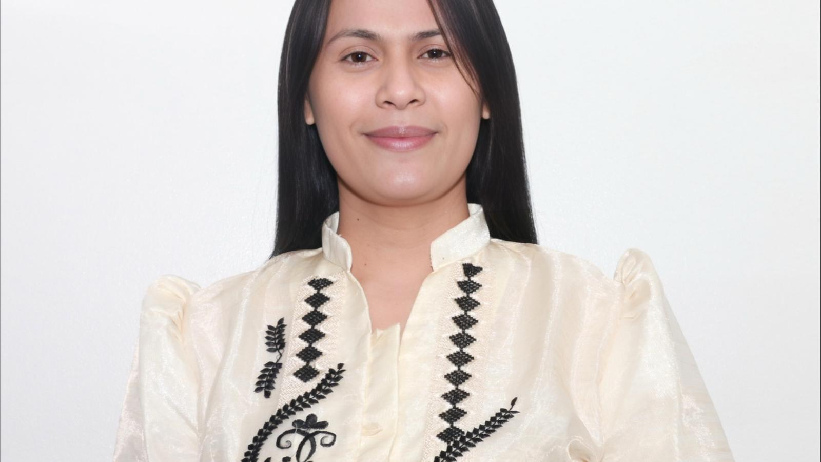 a person smiling at camera