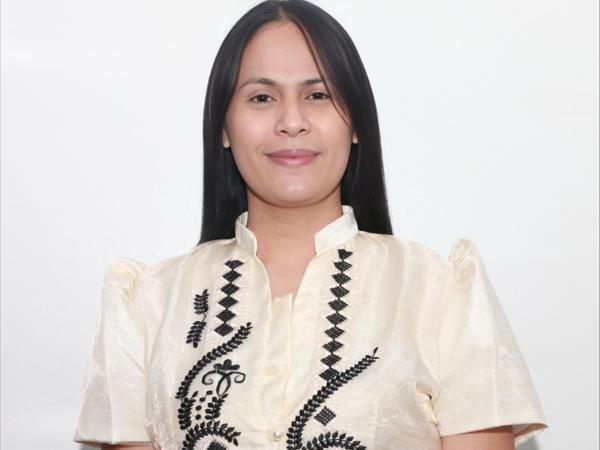 a person smiling at camera