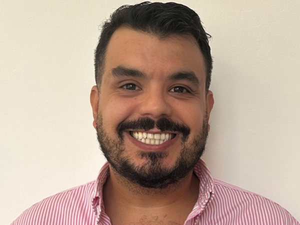 a person smiling at the camera
