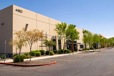 a building with trees in front of it
