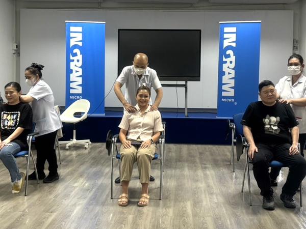 a person standing on a person's head