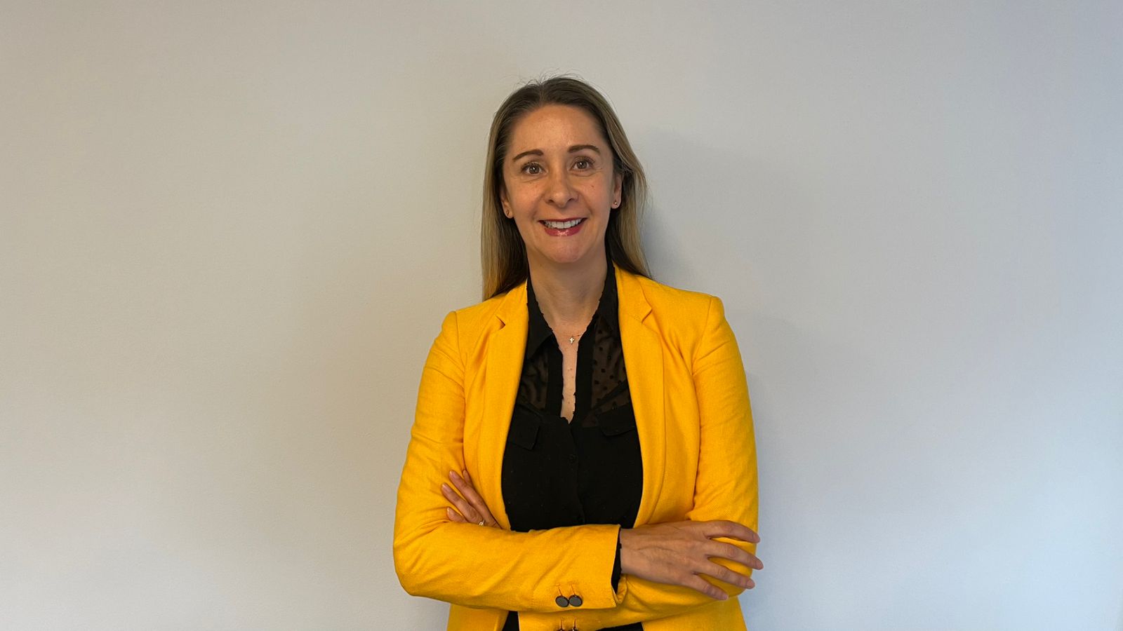a person in a yellow jacket