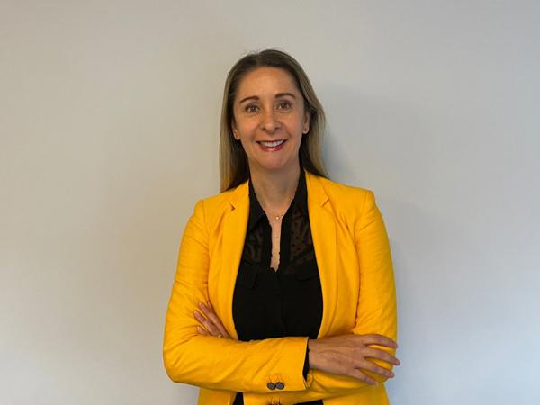a person in a yellow jacket