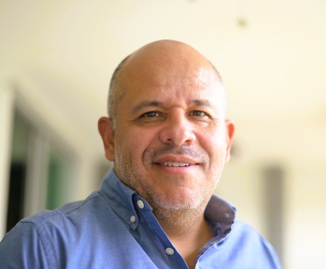 a person smiling for the camera