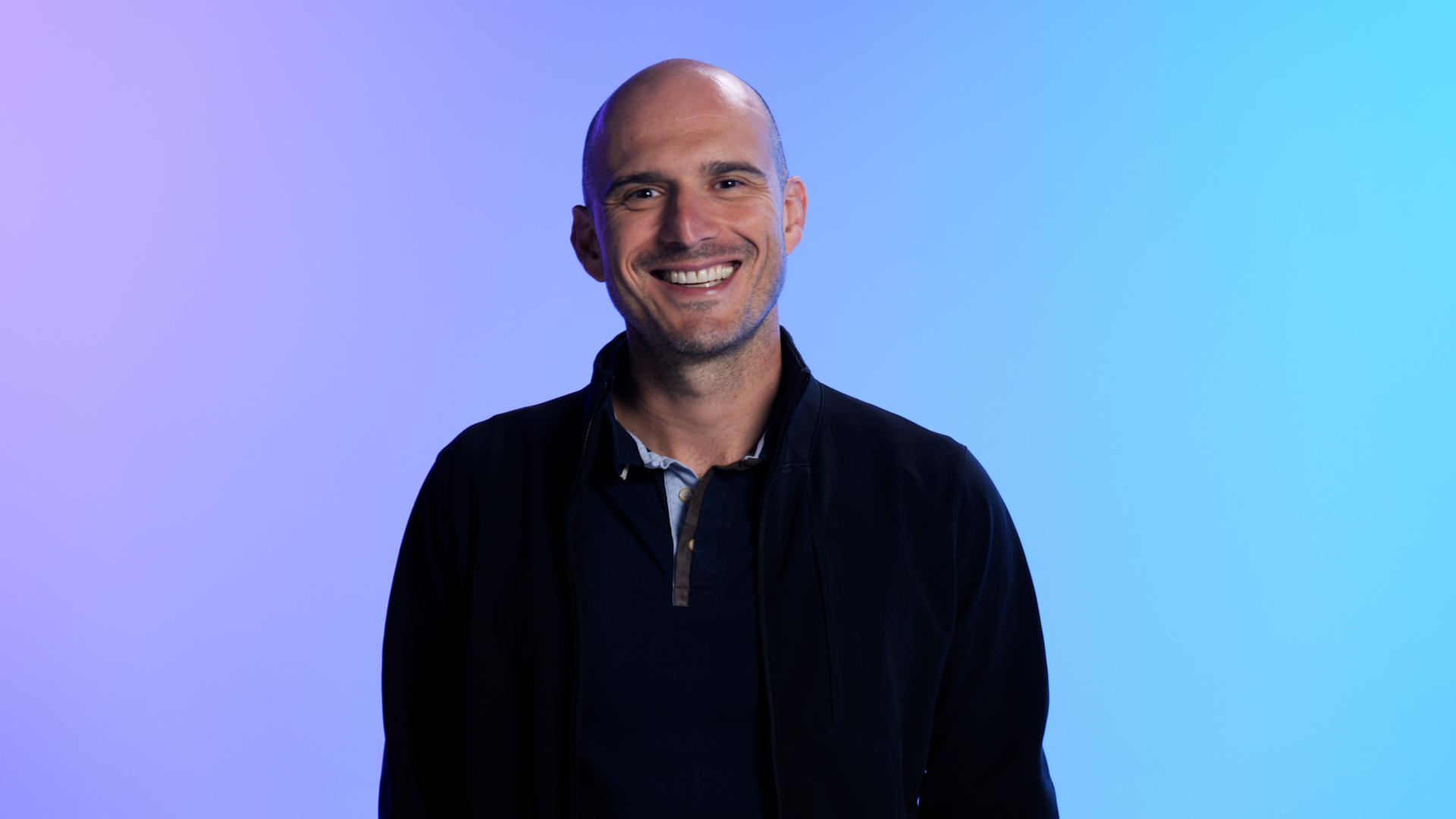 a person smiling at the camera