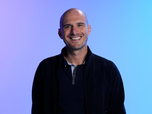 a person smiling at the camera