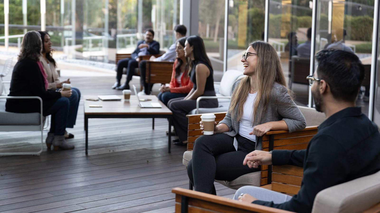 a group of people sitting on benches
