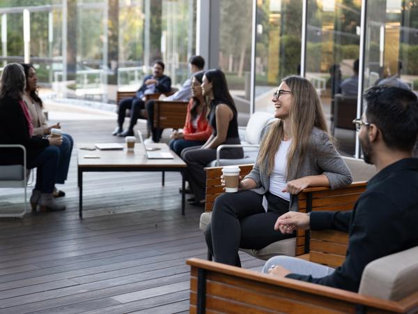 a group of people sitting on benches