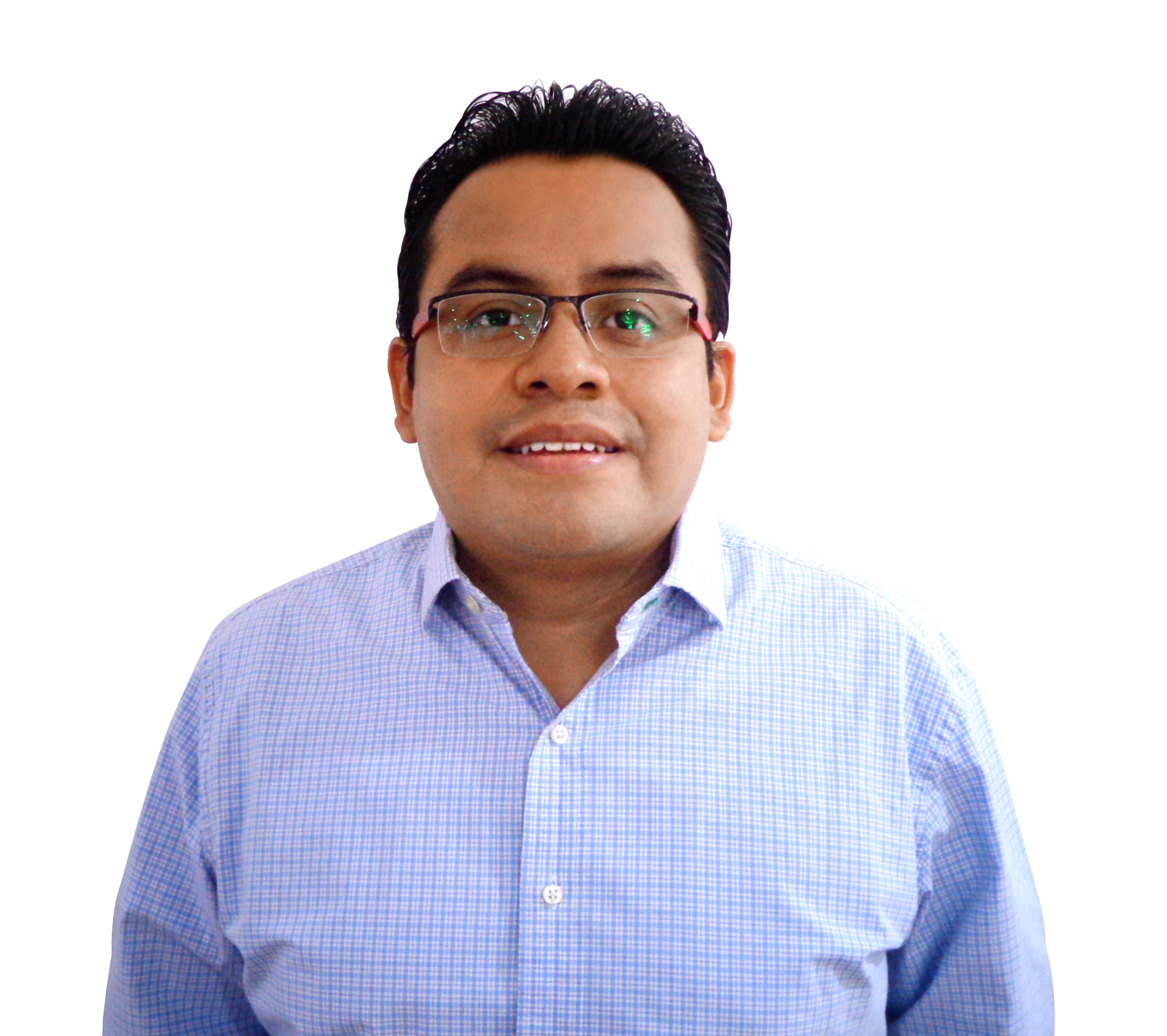 a person wearing glasses and a blue shirt